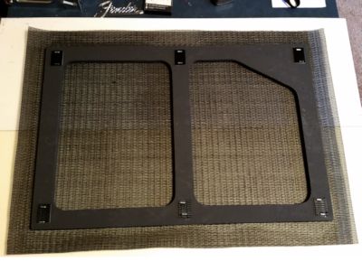 Cut the grille cloth.