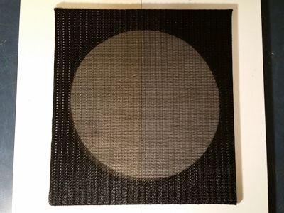 Front side of the frame with the grille cloth applied.