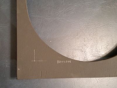 Lines on the grille frame.