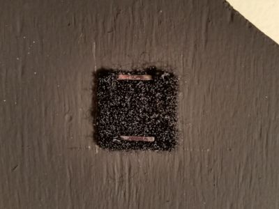 Cut grille cloth at corner Velcro.