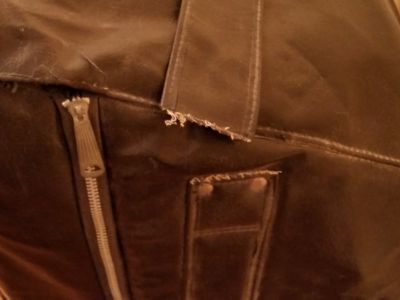 Closer look at the ripped handle.